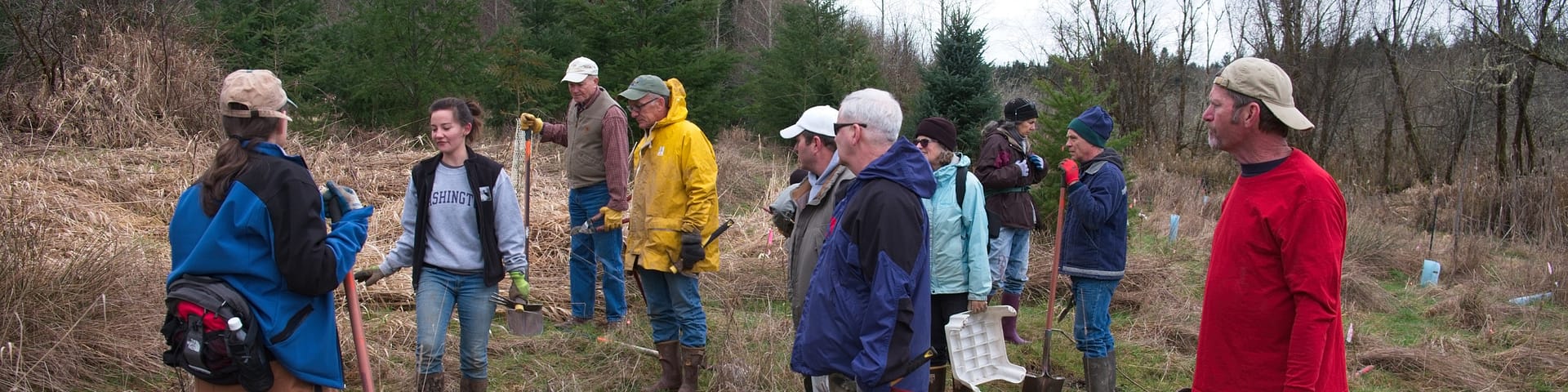 Volunteers standing in field