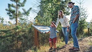 Family enjoying a walk on a Capitol Land Trust Preserve